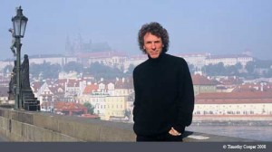 Timothy Cooper Standing and Smiling