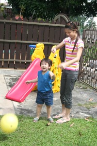 Happy Kid Playing with Woman